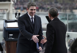President Barack Obama shakes the hand of poet Richard Blanco after his inaugural poem. 
